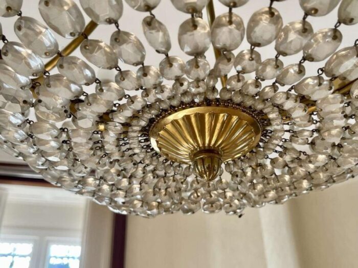 10 light chandelier in bronze and cut crystal 1960s 3542