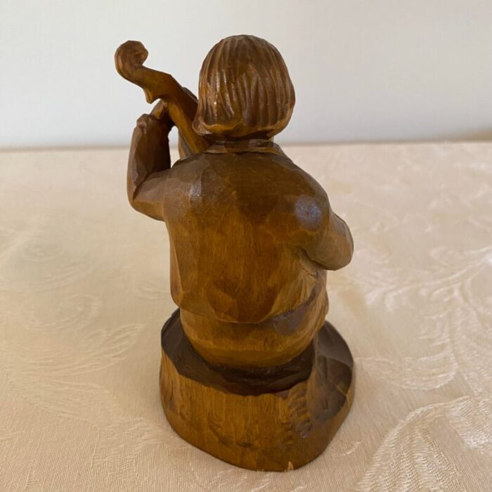 1980s folk art carved wood figurine signed 5517