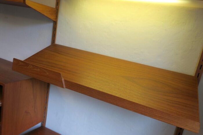 3 bay teak modular wall shelf system with desk and light by kai kristiansen for fm mbler denmark 1960s 3515