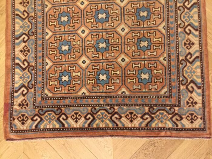 antique chinese brown and blue khotan rug 1870s 10