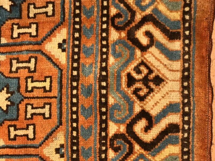 antique chinese brown and blue khotan rug 1870s 17