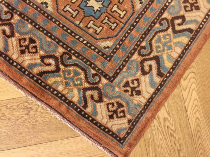 antique chinese brown and blue khotan rug 1870s 9