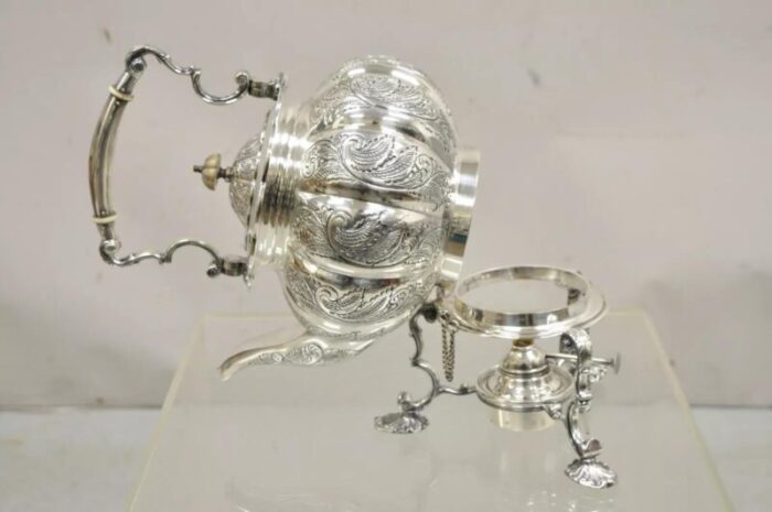 antique english victorian ps co silver plated tipping tea pot on warming base 1307