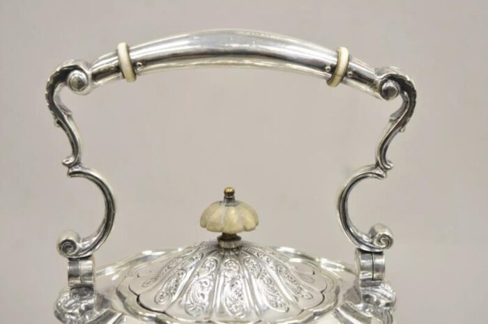 antique english victorian ps co silver plated tipping tea pot on warming base 7645