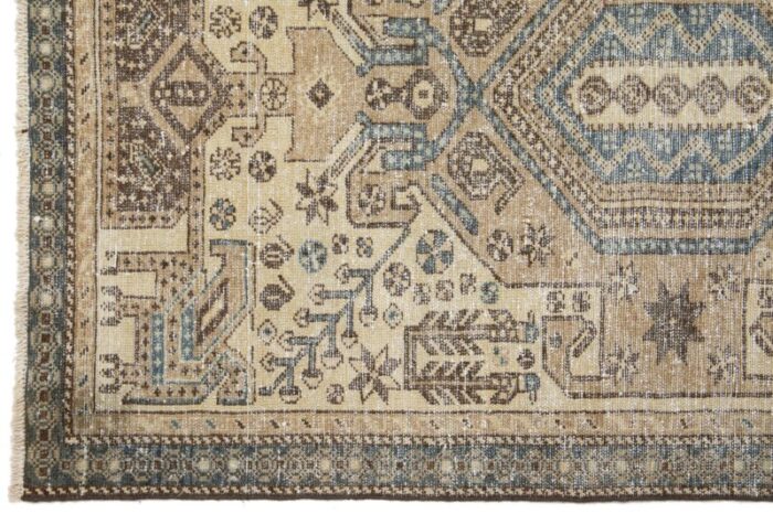 beige vintage persian distressed wool rug with allover pattern 2328