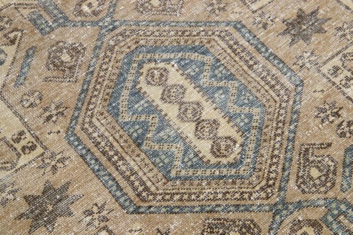 beige vintage persian distressed wool rug with allover pattern 2593