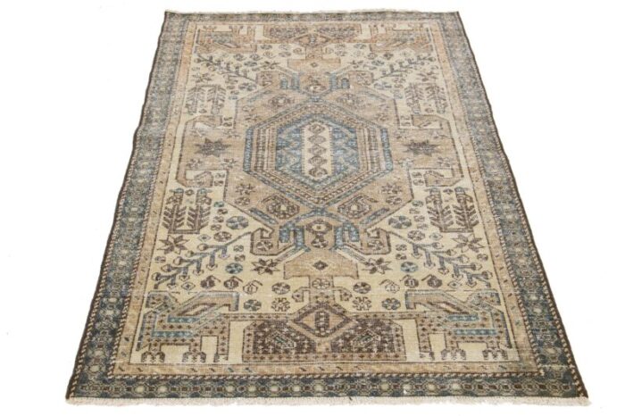 beige vintage persian distressed wool rug with allover pattern 5011