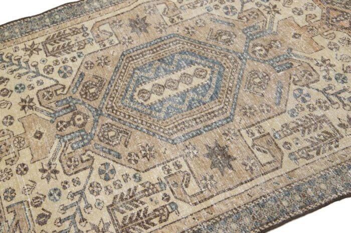 beige vintage persian distressed wool rug with allover pattern 6648