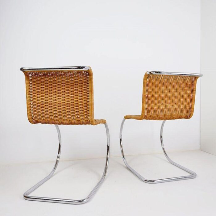 chrome and wicker cantilever chairs in the style of mies van der rohe set of 2 5351