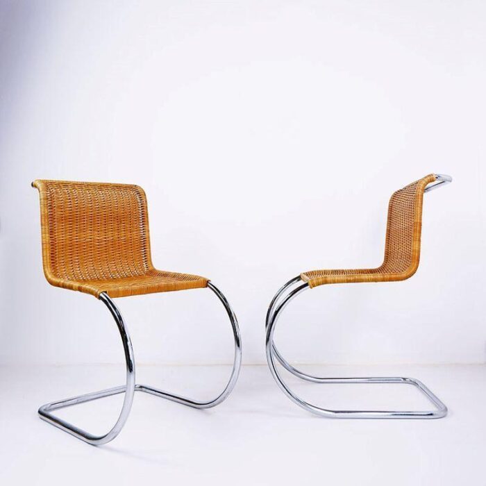 chrome and wicker cantilever chairs in the style of mies van der rohe set of 2 6440