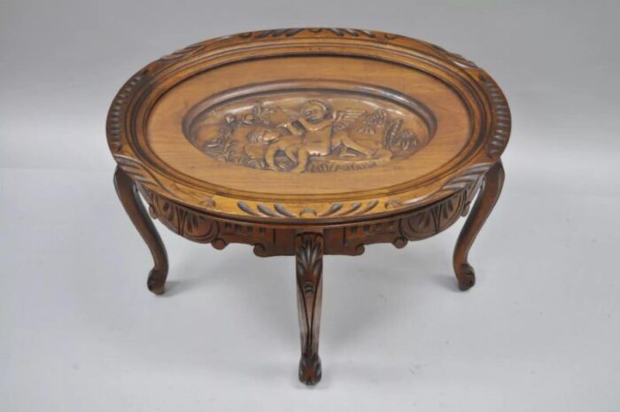 french renaissance style glass top tray coffee table with carved cherubs angels 1732