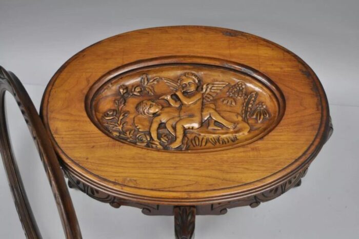 french renaissance style glass top tray coffee table with carved cherubs angels 7242