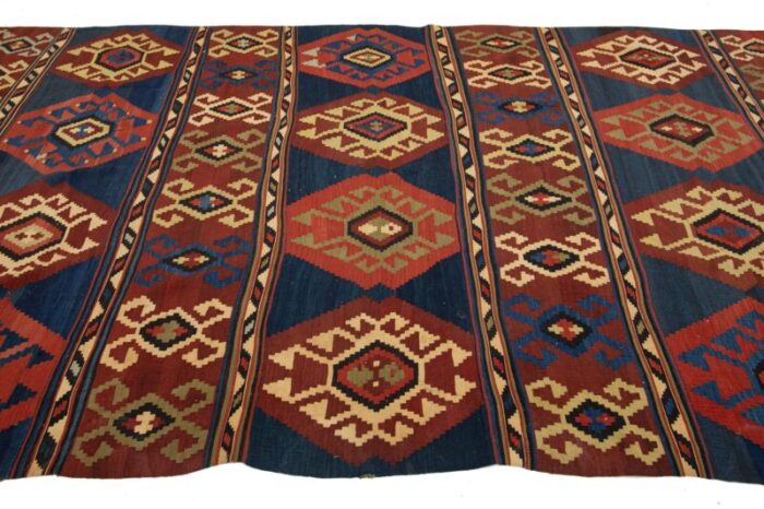 handmade vintage turkish kilim wool rug allover geometric in blue and red 0464