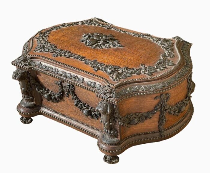 large carved wooden box with bronze garlands from maison tahan 2