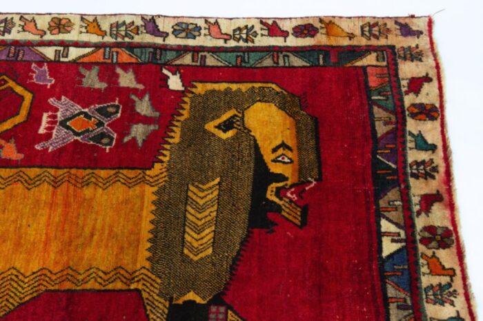 late 20th century middle eastern hand knotted wool tiger pictorial tribal red rug 2