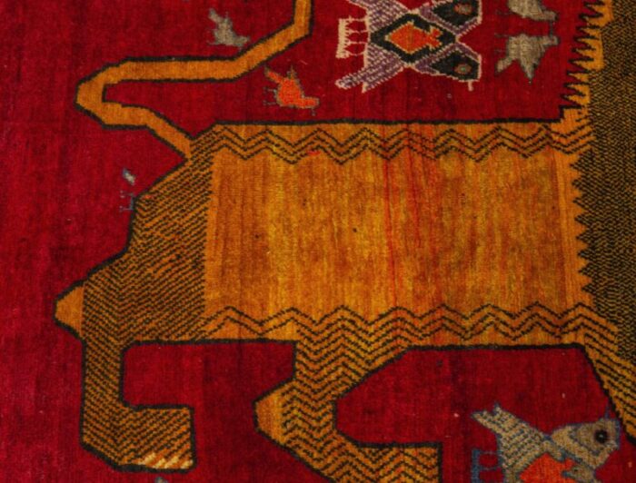 late 20th century middle eastern hand knotted wool tiger pictorial tribal red rug 3