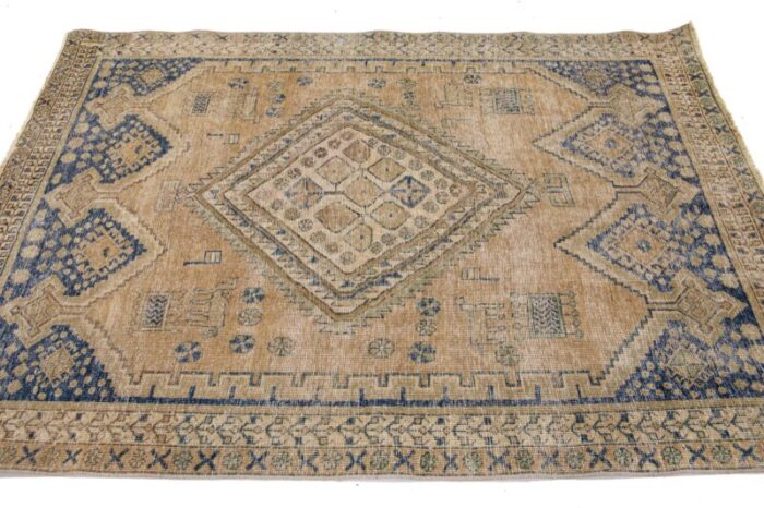 light brown vintage distressed persian scatter wool rug with medallion motif 9463