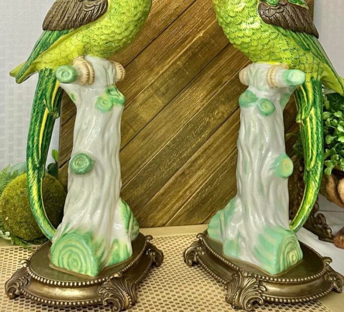 mid 20th century castilian imports parrot porcelain and bronze candle holders a pair 9116