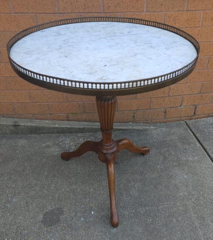 mid century french mahogany marble top galleried gueridon table 2555