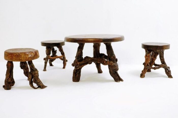 primitive stools with round slab seat and legs constructed from vines 1960s set of 4 0980