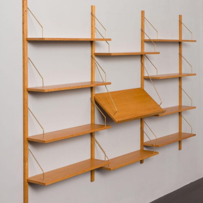 scandinavian upcycled oak wall unit with expository shelf in the style of poul cadovius 4403