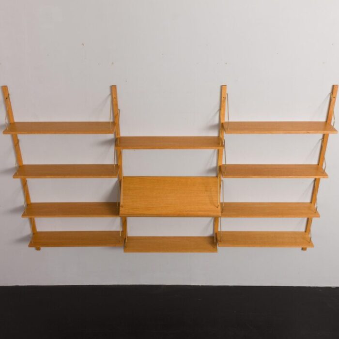 scandinavian upcycled oak wall unit with expository shelf in the style of poul cadovius 9546