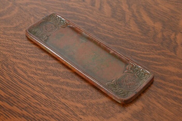 tiffany studios new york zodiac patinated bronze pen tray circa 1910 2932