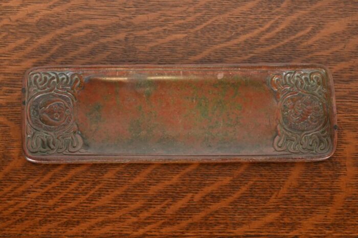 tiffany studios new york zodiac patinated bronze pen tray circa 1910 7831