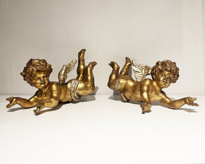 wood cupids early 1900s set of 2 1